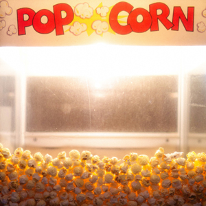 Popcorn in a machine at a movie theater as an analogy of being distracted and having your cybersecurity credentials stolen